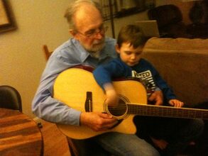 GG son Zachary learning guitar